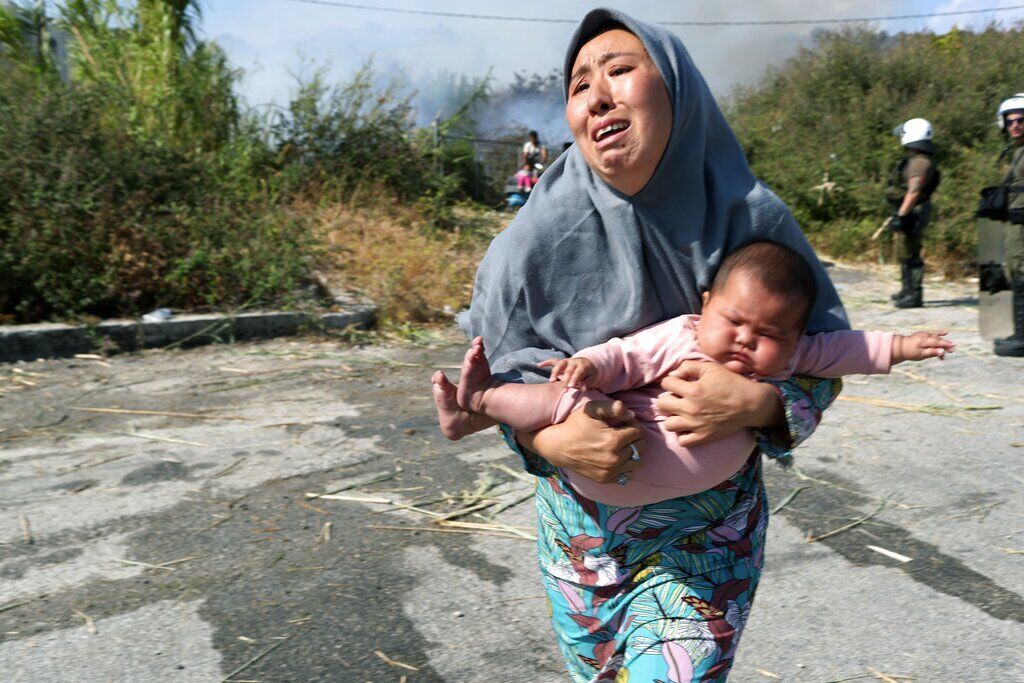 APTOPIX Greece Migrant Camp Blaze